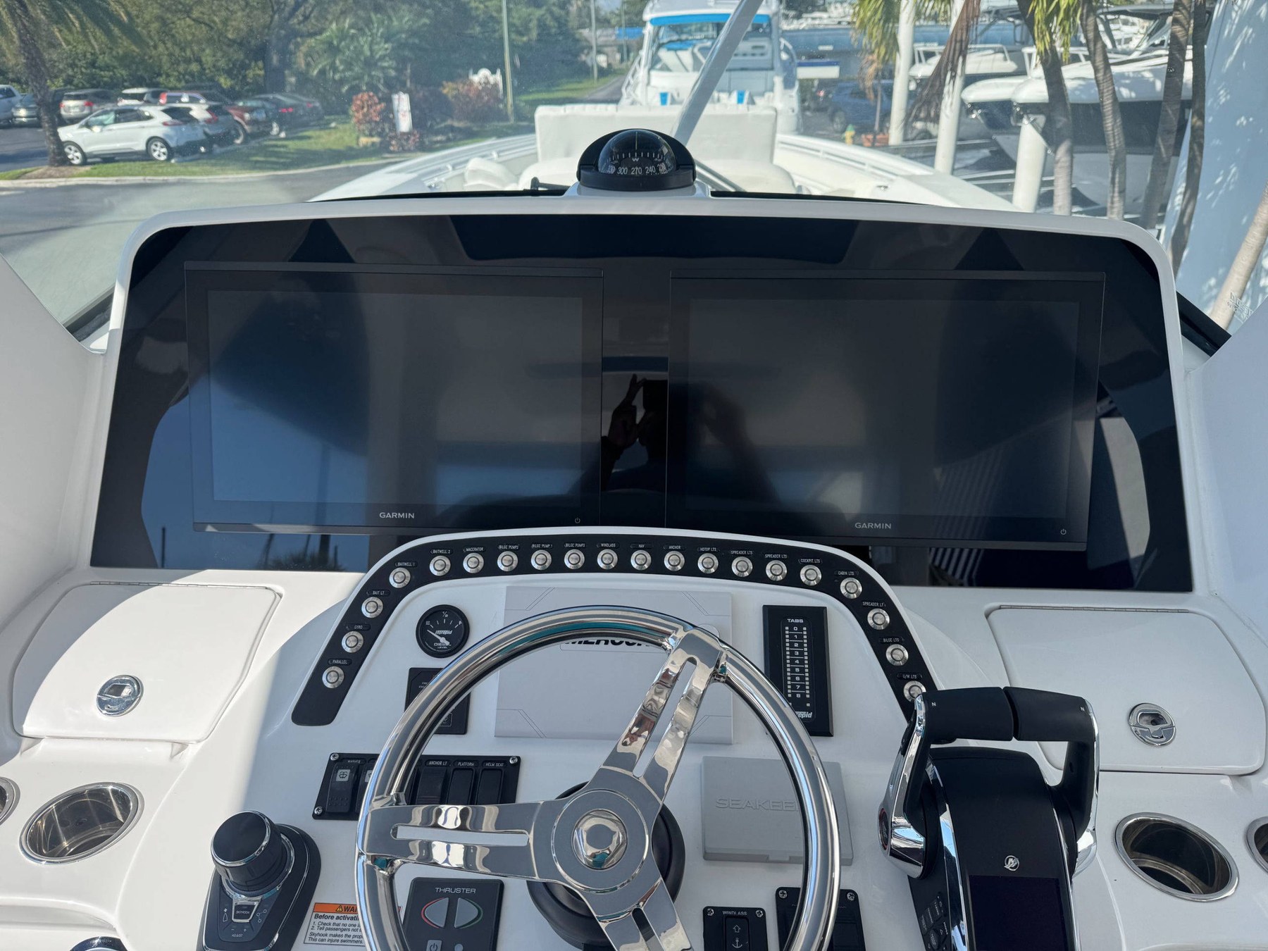 Intrepid center console — twin blacked-out Garmin 12-inch displays in a clean integrated pod