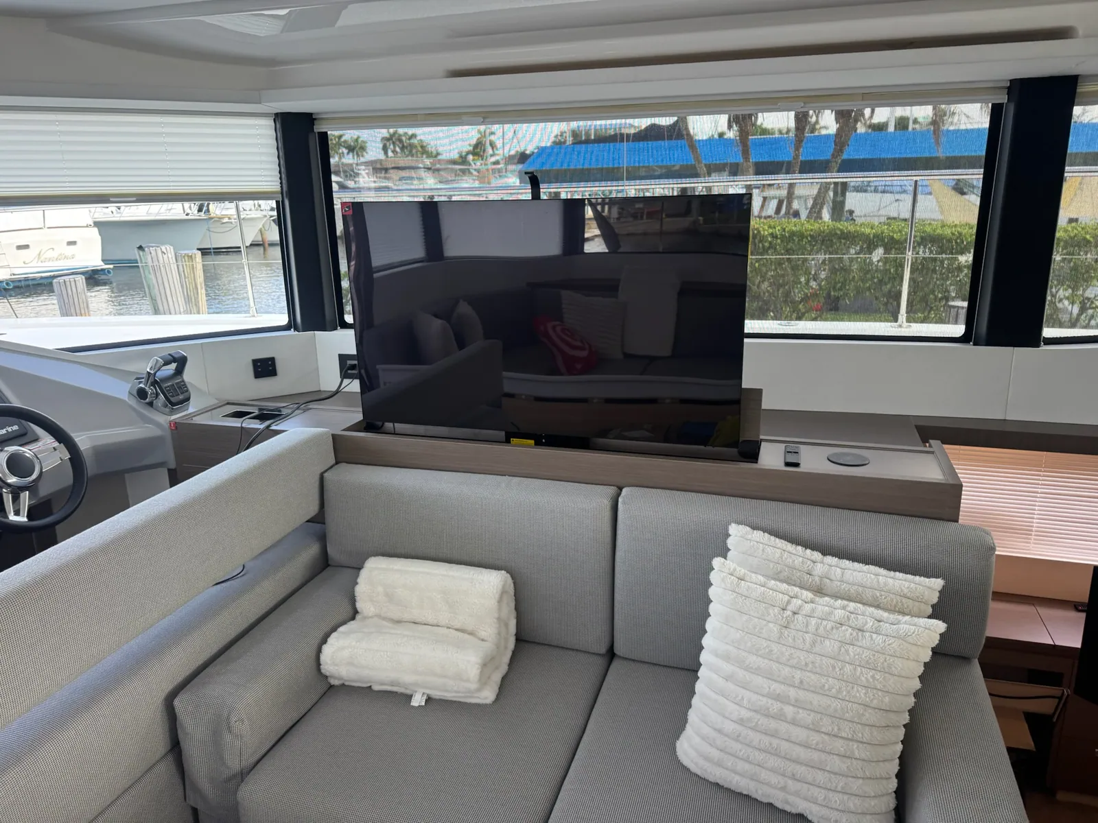 Pop-up TV in a yacht salon