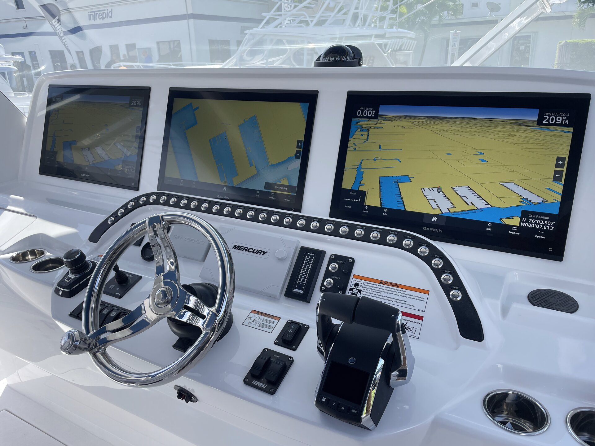 Invincible center console with triple Garmin chartplotters